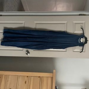 A denim jumpsuit w/side pockets